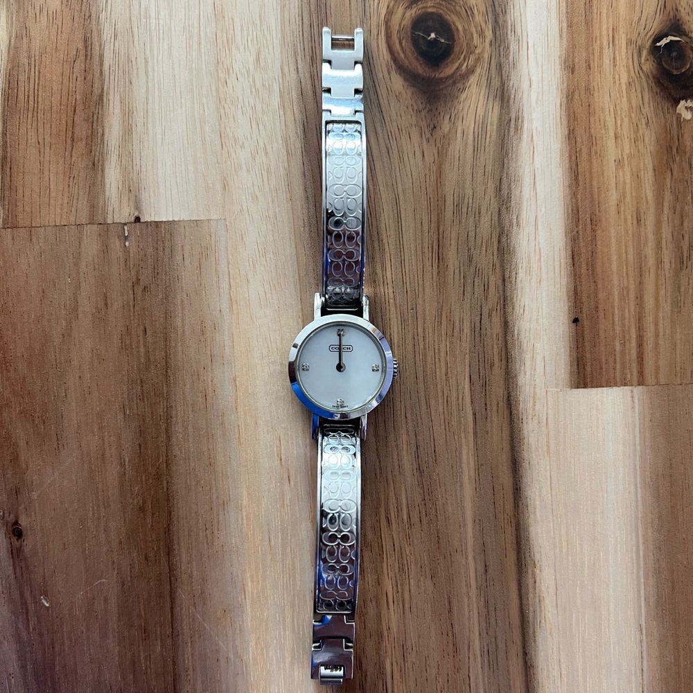 COACH mother of pearl bangle watch